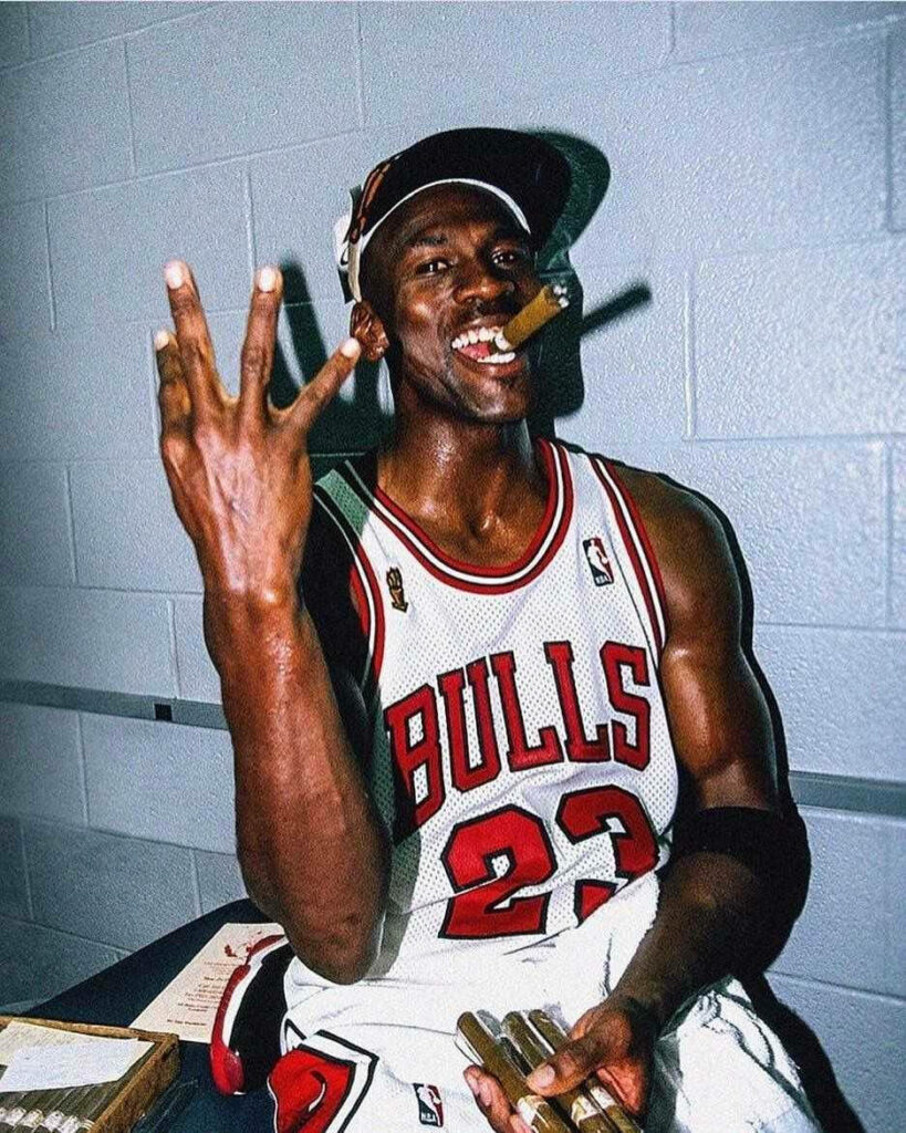 The Iconic Michael Jordan: Unleashing Basketball Greatness with Style and Swagger Wallpaper