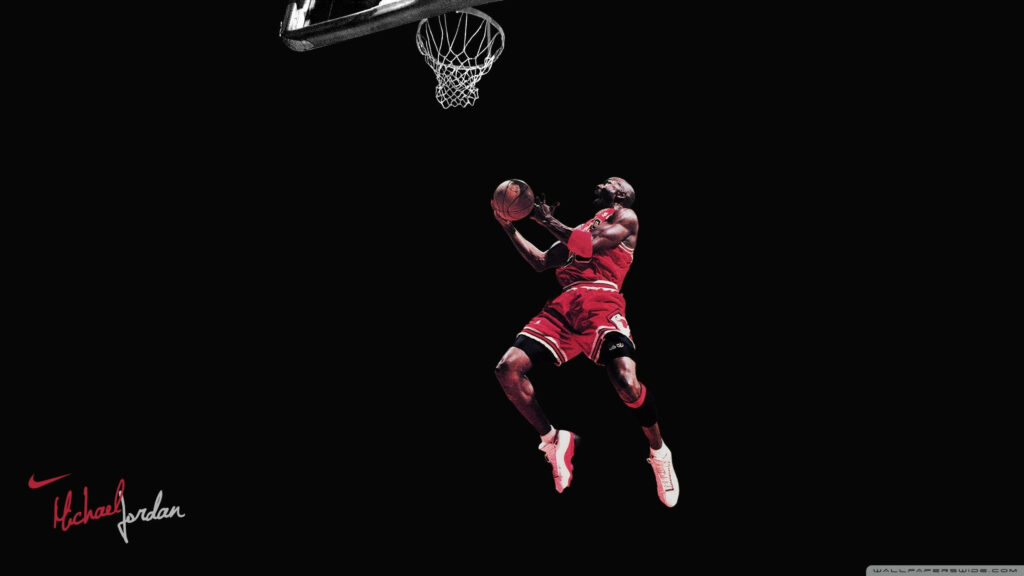 Dominance Forever: Michael Jordan's Iconic Slam Dunk in Red Jersey Wallpaper