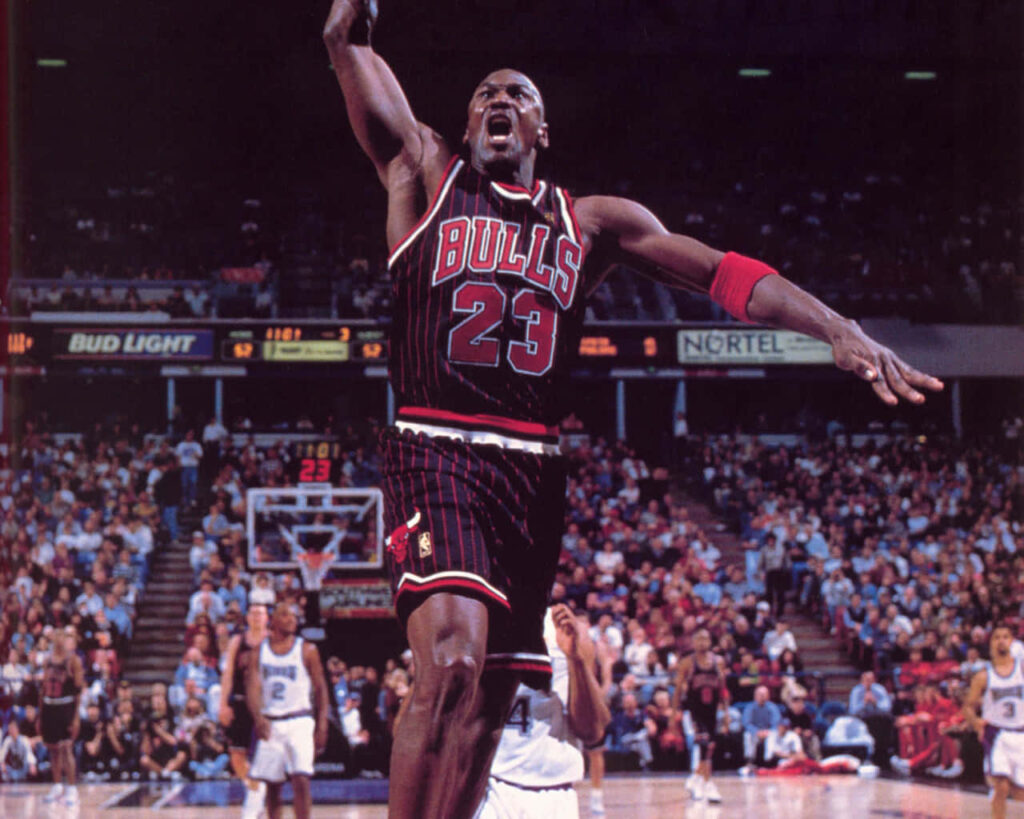 Legendary Michael Jordan: Immortalized in His Iconic Bulls No.23 Jersey, Fusing Iconic Brand and Legacy Wallpaper