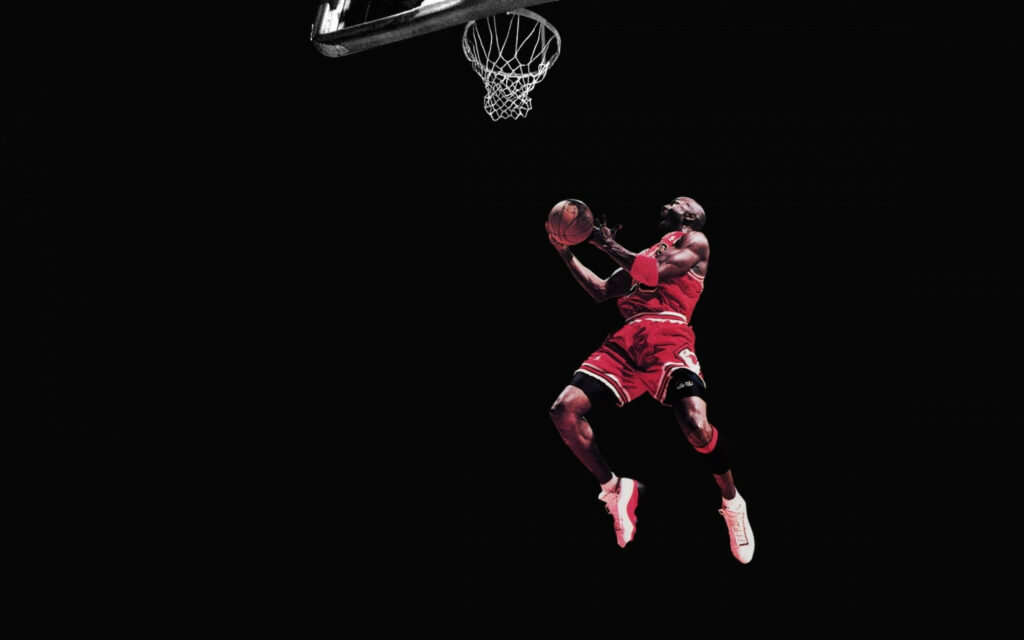Gravity-Defying Michael Jordan Effortlessly Defying Limits in Mesmerizing Monochrome Shot Wallpaper