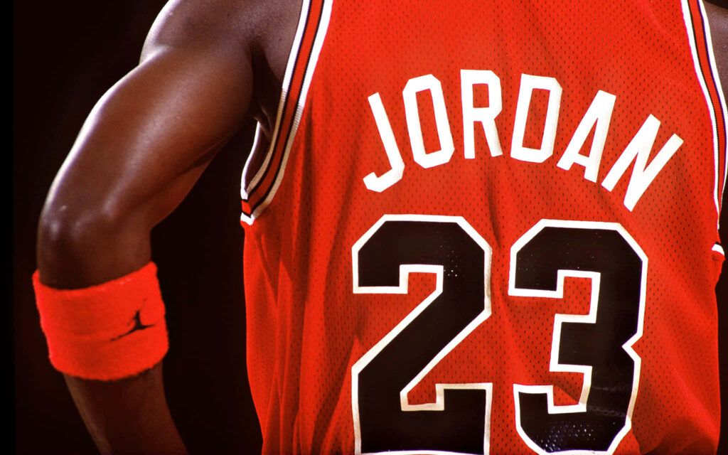 The Iconic Legacy: Capturing Michael Jordan's Dominance in the #23 Chicago Jersey Wallpaper