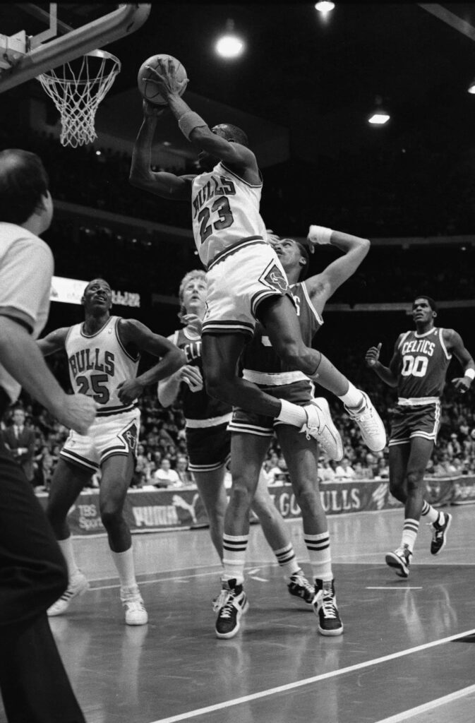 Iconic Legend: The Unparalleled Basketball Journey of Michael Jordan Wallpaper