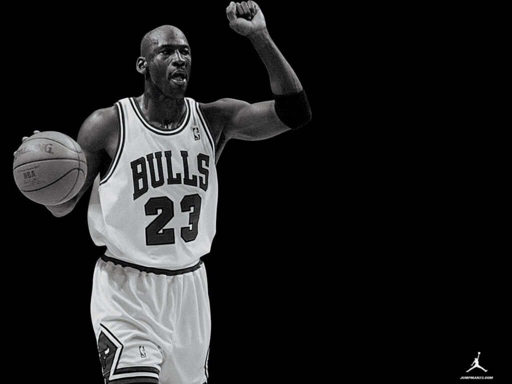 Iconic Tribute: Michael Jordan's Timeless Legacy Captured in Sleek Monochrome Wallpaper