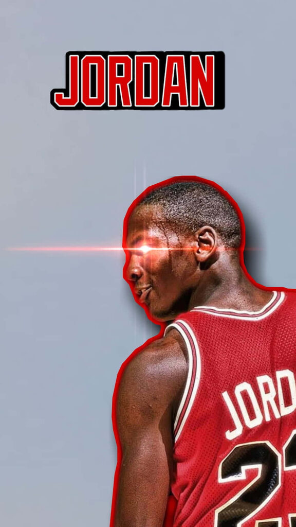 Jordan's Dominance Unleashed: Dynamic Basketball Wallpaper featuring His Iconic Back Angle and Intense Gaze on Gray Canvas
