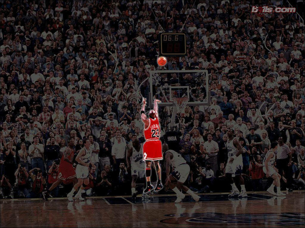 Jordan's Vintage Mastery: A Photographic Exhibition of His Iconic Shot in Action Wallpaper