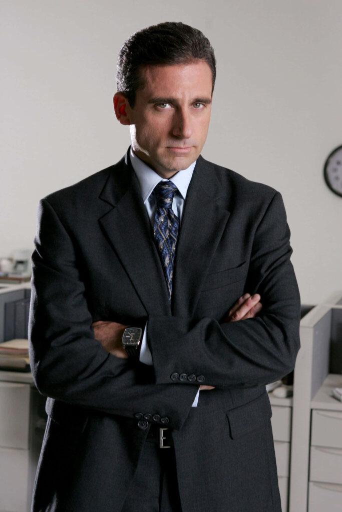 Elegant Wallpaper of Michael Scott in Formal Office Attire