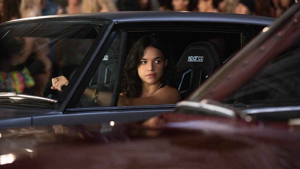 Michelle Rodriguez as Letty Ortiz driving classic muscle car Sparco seat Fast and Furious scene Wallpaper