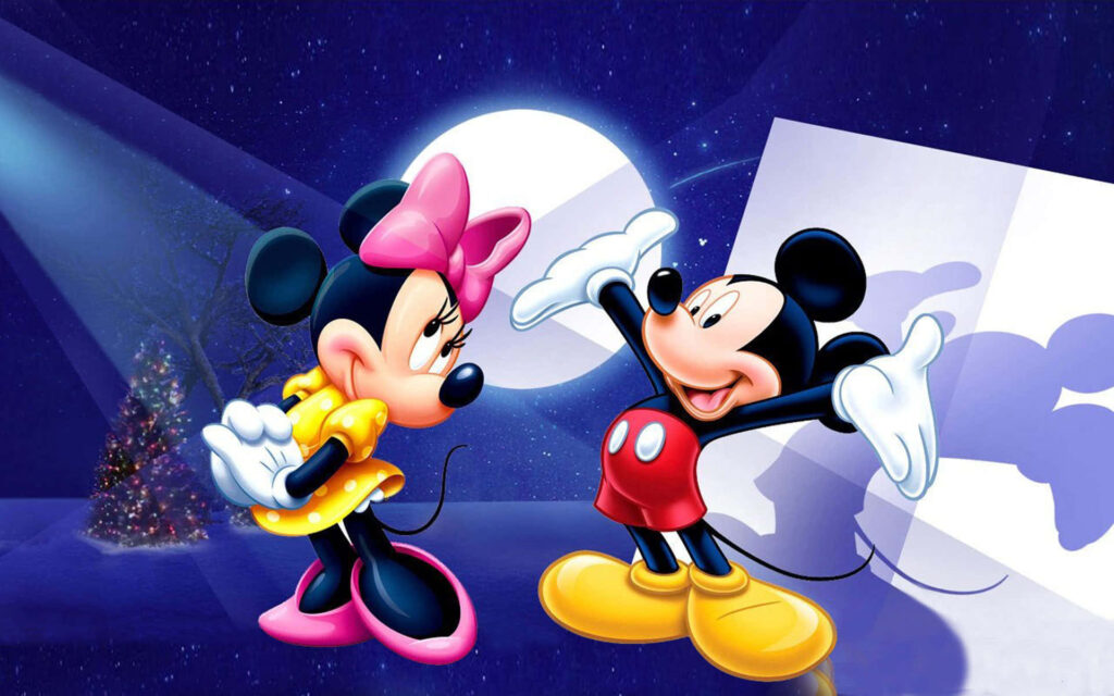 Mickey and Minnie's Festive Spotlight: An Enchanting Christmas-Tree Encounter Wallpaper