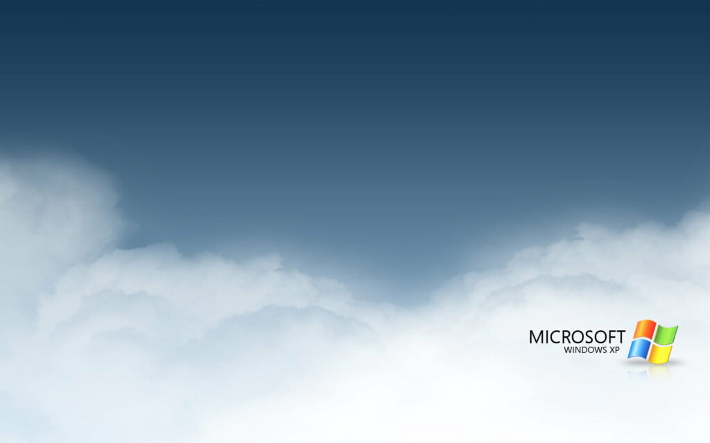 Windows XP Cloudscape: A stunning HD wallpaper featuring blue and white clouds with the iconic Microsoft logo