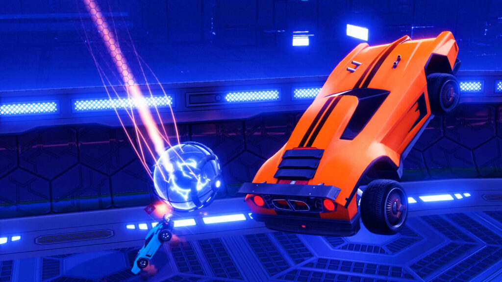 Rocket League Showdown: Orange Car Soars Next to the Ball, with Light Blue Rival in Pursuit - Stadium of Blue Dreams Wallpaper