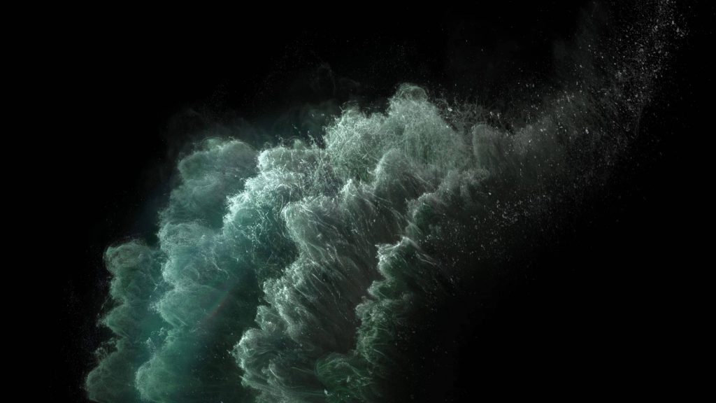 Midnight Green iPhone 11 Pro wallpaper with teal and grey swirling abstract particles on black background