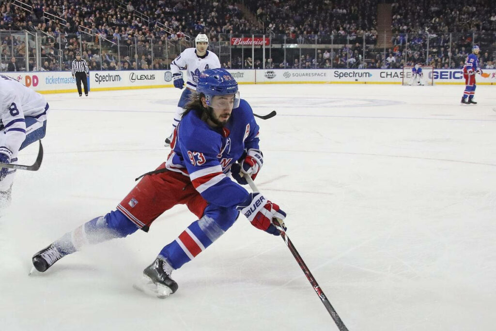 Mika Zibanejad NHL Action Wallpaper: Skill & Focus on Ice
