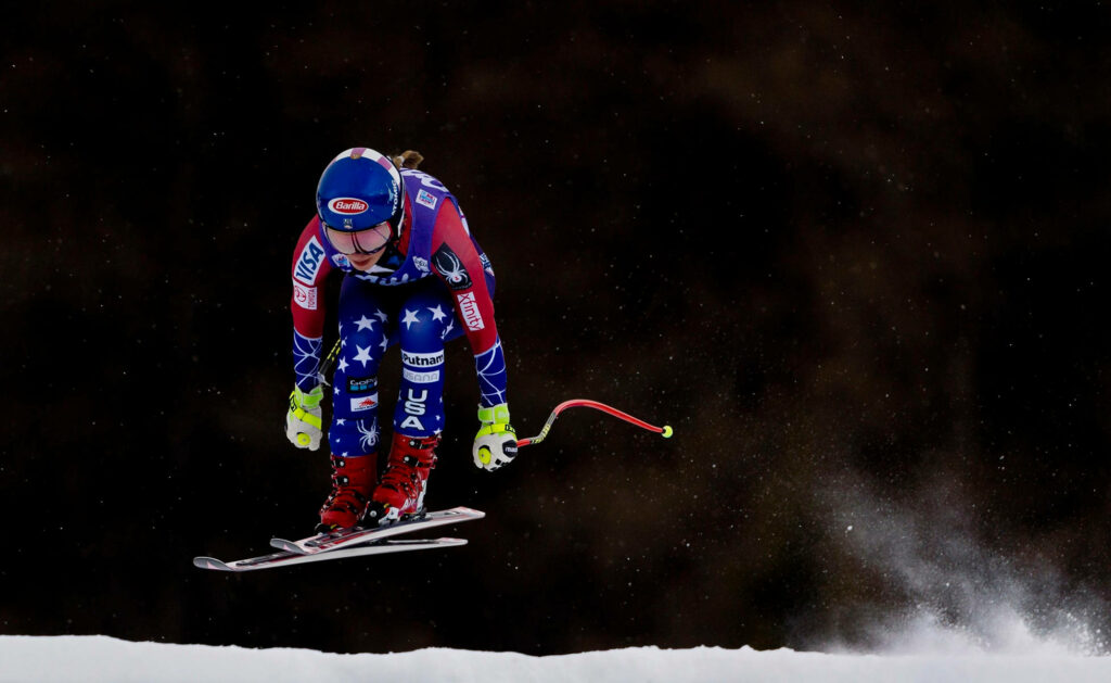 Mikaela Shiffrin: Intense Alpine Skiing Action Shot Wallpaper