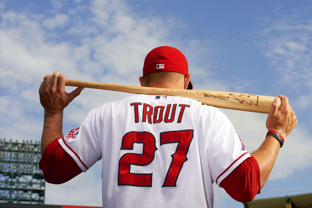 Mike Trout Wallpaper: Confident Baseball Star with Jersey #27