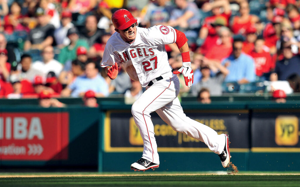 Dynamic Mike Trout Running in Action - Vibrant Baseball Wallpaper