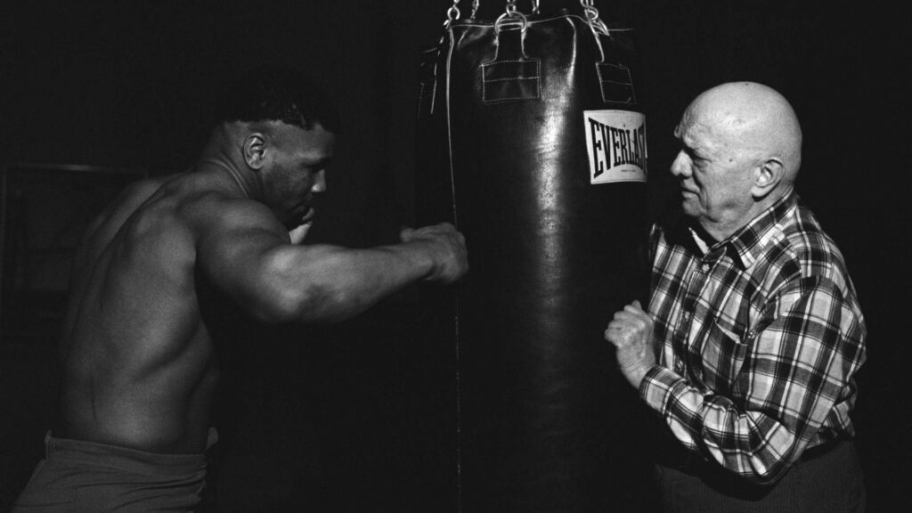 Mike Tyson & Cus D'Amato: Iconic Boxing Bond Wallpaper Background