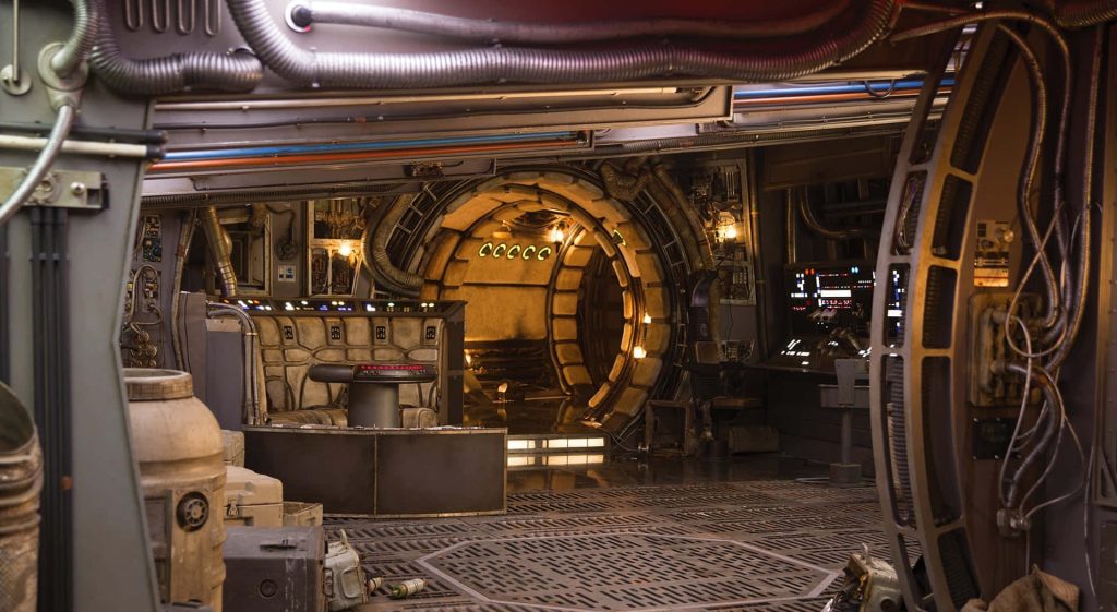 Millennium Falcon interior detailed Star Wars wallpaper with Dejarik table and warm lighting