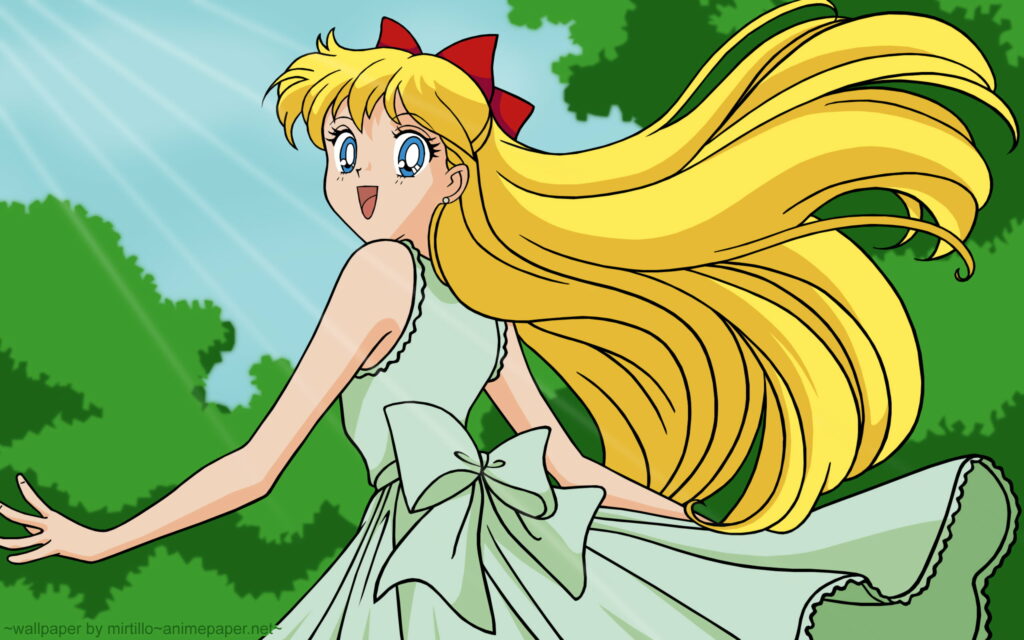Glowing Goddess: Minako Unleashes her Power in this Stunning Sailor Venus Anime Wallpaper