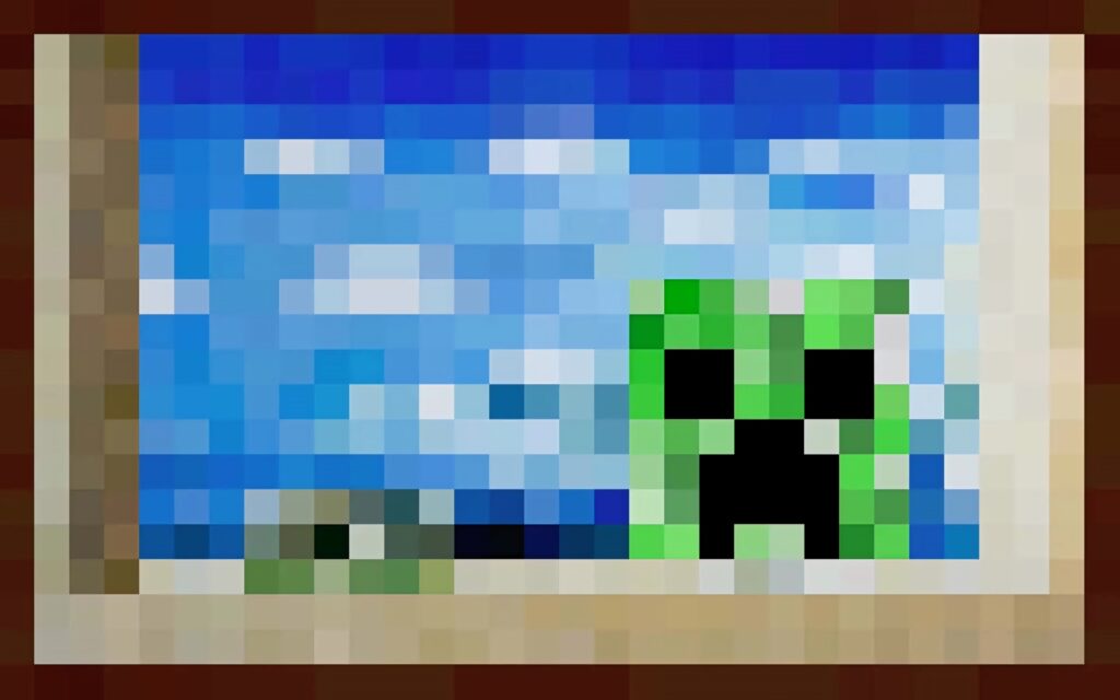 Pixelated Minecraft Creeper face wallpaper with vibrant green character and blue sky background