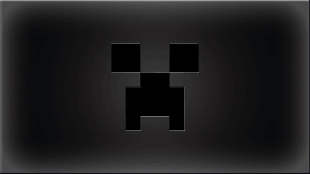 Minecraft Creeper face wallpaper with pixelated design on black gray gradient background