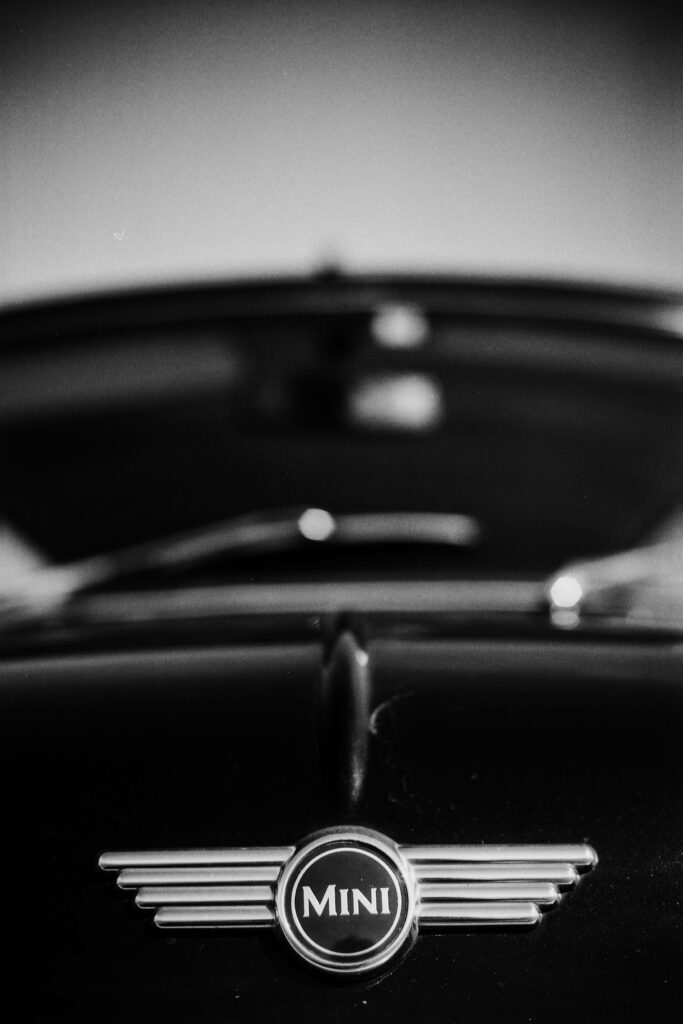 Mini Cooper Logo Close-Up: Iconic Grayscale Wallpaper Background
