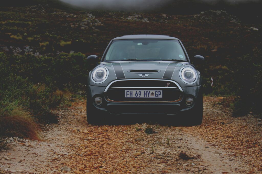 Mini Cooper S Wallpaper: Sporty Design in Rugged Landscape