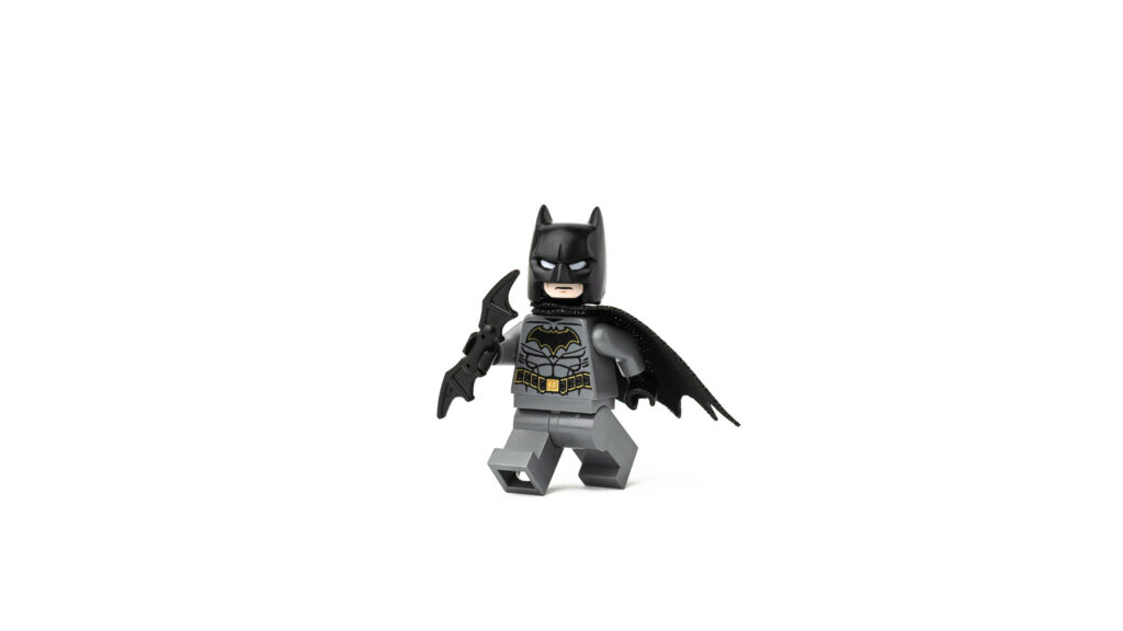 Tiny Lego Batman: A Minimalist Tribute to DC Comics' Iconic Dark Knight Wallpaper