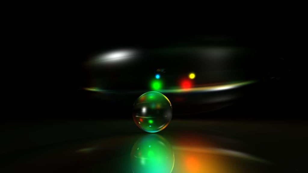3D glass sphere on reflective surface with red green light refractions black background wallpaper