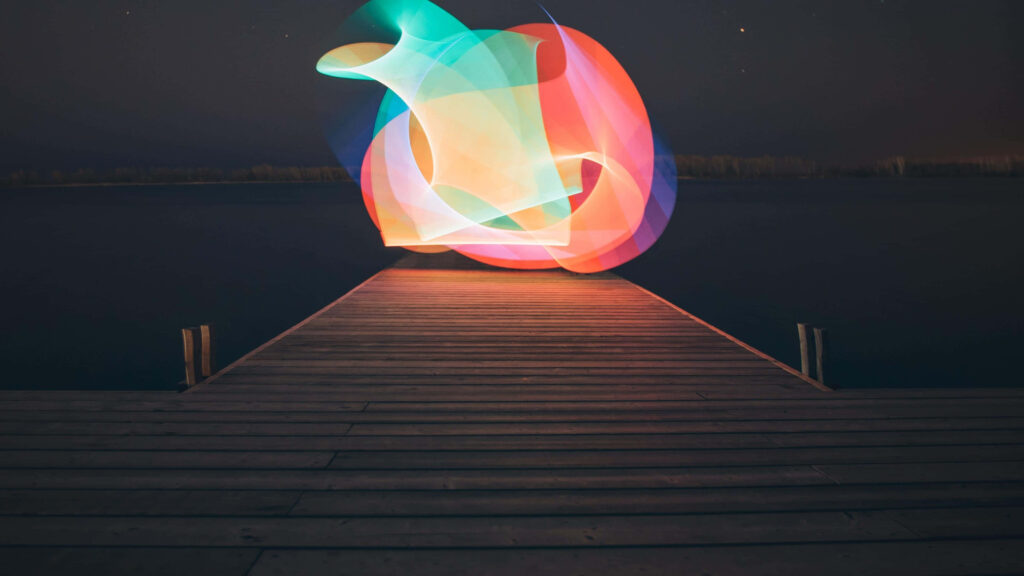 Minimalist Abstract Wallpaper: Colorful Sphere on Dark Pier Background