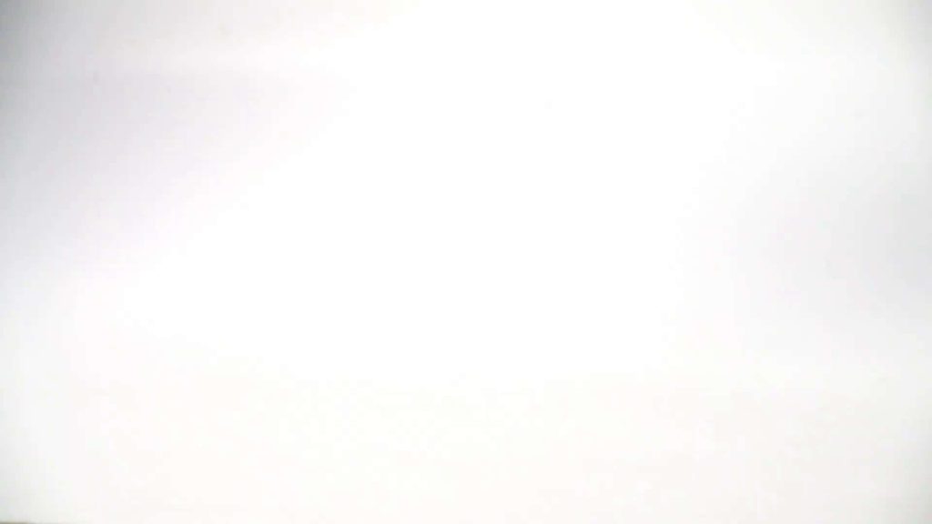 Minimalist all white background with smooth surface and bright even lighting for design projects Wallpaper