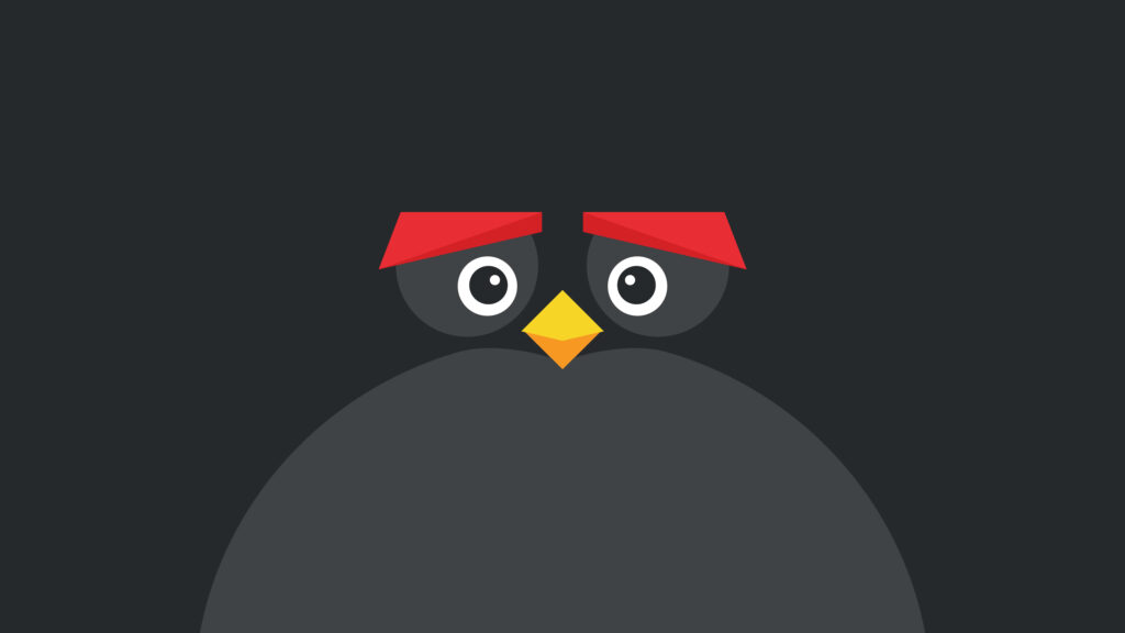 Minimalist Angry Birds Bomb wallpaper with red eyebrows wide eyes yellow beak on dark background