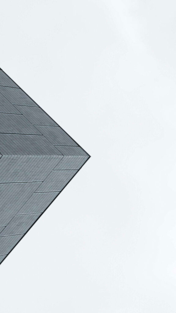 Minimalist Architectural Wallpaper: Sleek Building on Light Grey Background