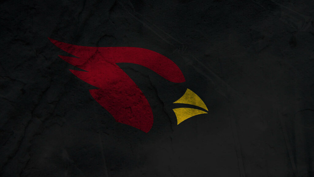 Minimalist Arizona Cardinals red bird logo on dark textured background with vibrant red and yellow colors Wallpaper