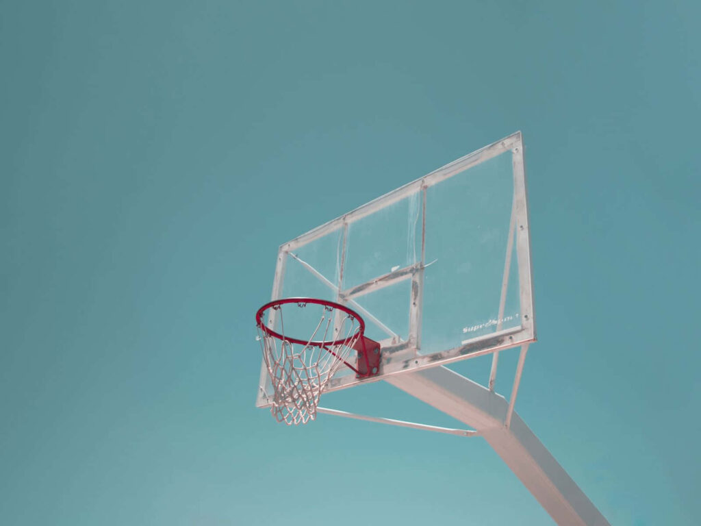 Minimalist Basketball Hoop Wallpaper Against Clear Blue Sky