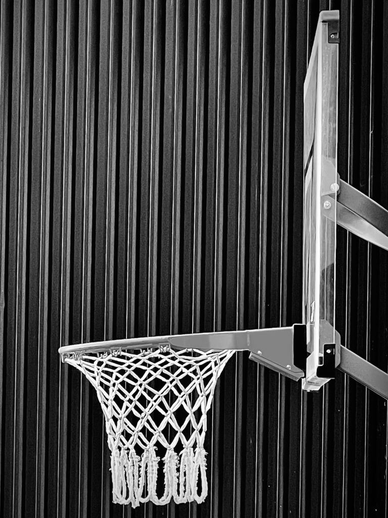 Minimalist Black and White Basketball Hoop Wallpaper for Modern Spaces