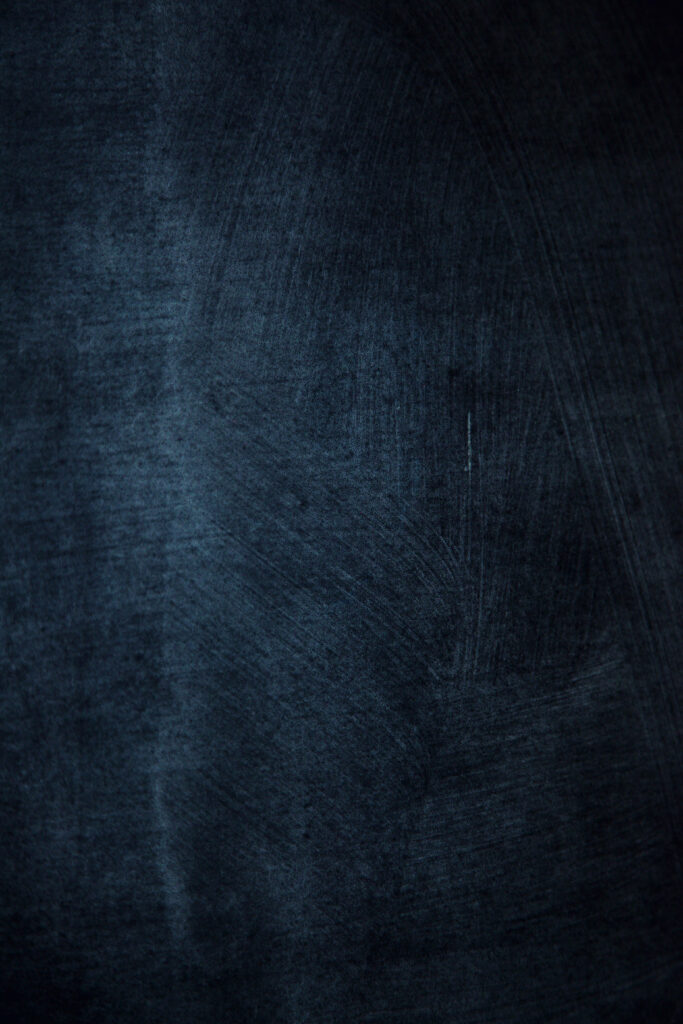 Sleek Black Textured Wallpaper: Minimalist Sophistication Background