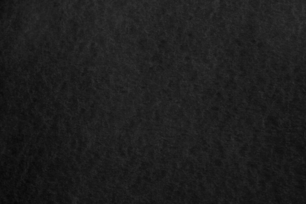 Elegant Minimalist Black Textured Wallpaper with Subtle Patterns