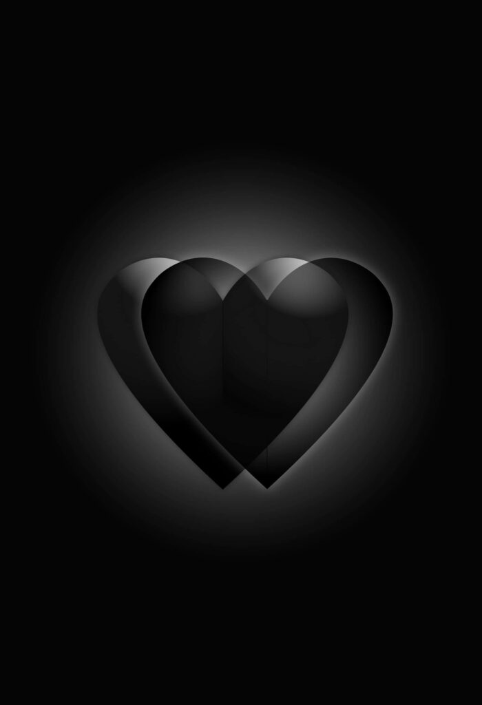 Minimalist Black Wallpaper: Broken Heart Design for Pain & Sorrow