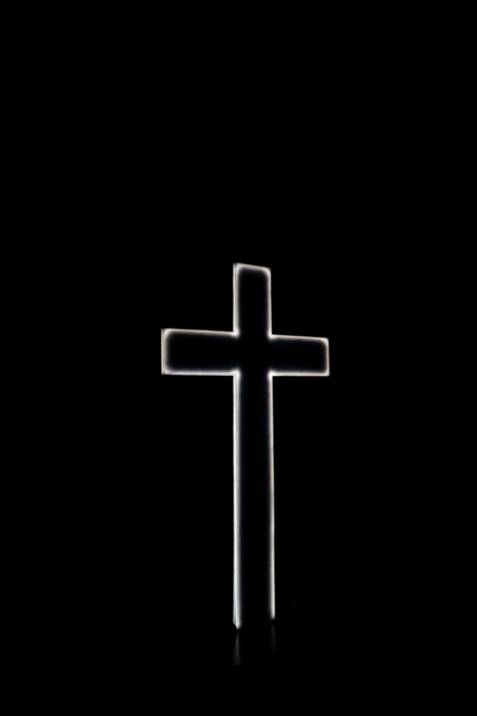 Minimalist Black Wallpaper with Striking White Cross Design