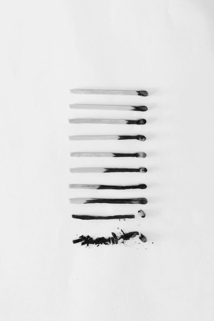 Minimalist Black and White Matchstick Wallpaper - Time & Transformation