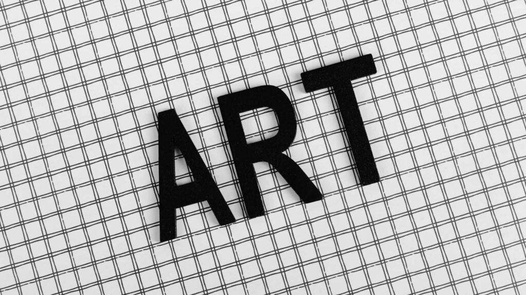 Minimalist Black and White Wallpaper with 'ART' on Grid Background