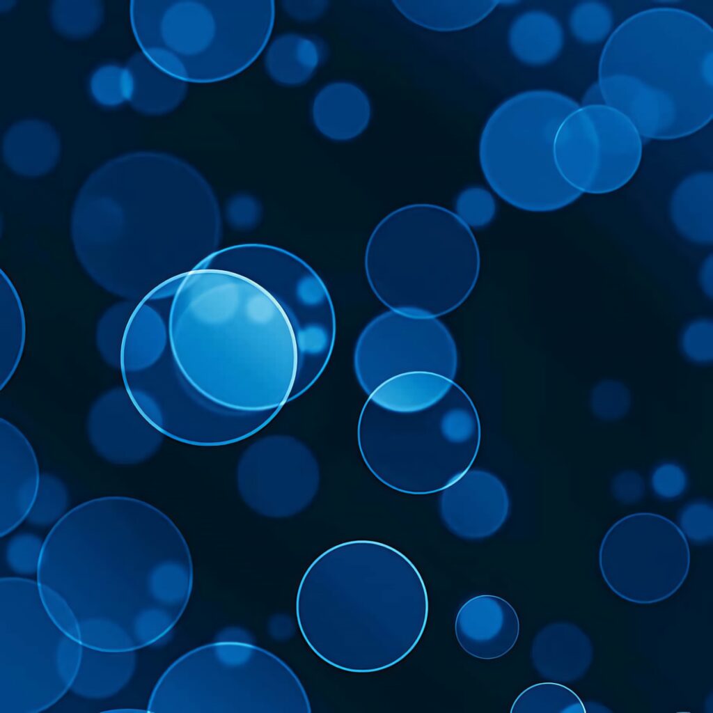 Abstract minimalist wallpaper with layered blue circles on navy background modern bokeh effect