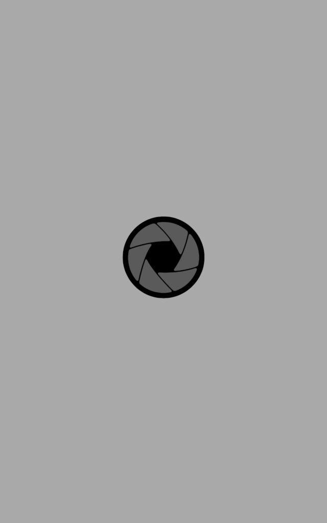 Minimalist Camera Lens Wallpaper for iPad - Neutral Gray Background