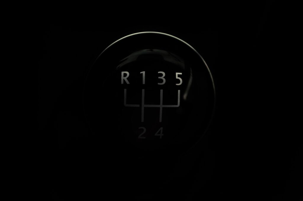 Minimalist Car Gearshift Lever Wallpaper: Sleek Transmission Design