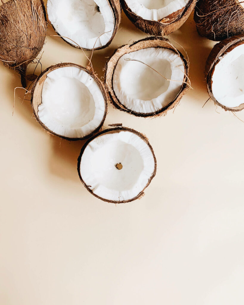 Minimalist Coconut Wallpaper: Rustic Freshness on Beige Background