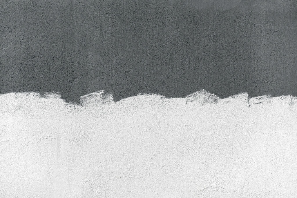 Minimalist Textured Concrete Wallpaper with White Paint Contrast