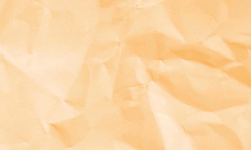 Minimalist crumpled paper wallpaper with soft light orange creases and delicate shadows texture