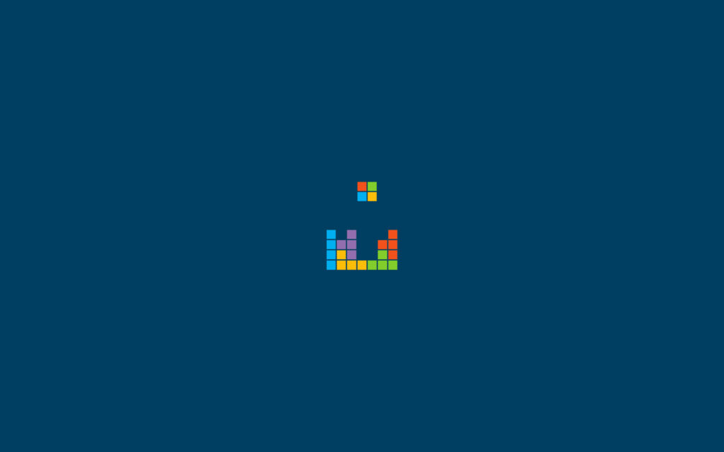 Minimalist Dark Blue Wallpaper with Colorful Tetris-Style Blocks