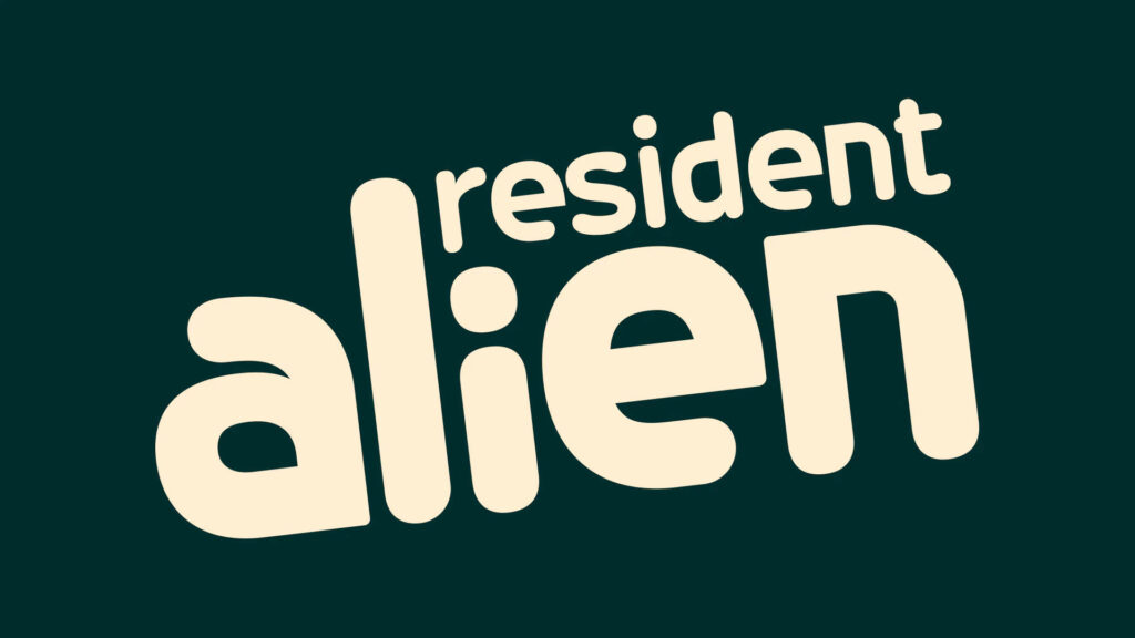 Minimalist Dark Green Wallpaper: Resident Alien in Cream Typography