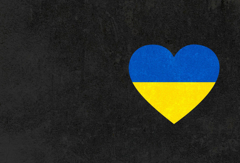 Minimalist Dark Wallpaper: Heart Design in Ukraine Colors